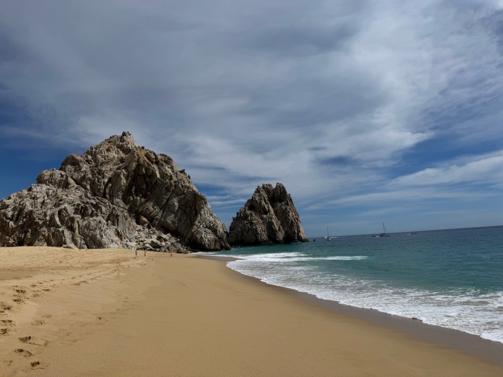 Beach with rock formations in the background