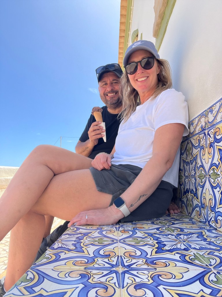 Sitting on a beautiful bench, having an ice cream snack at Benagil Beach