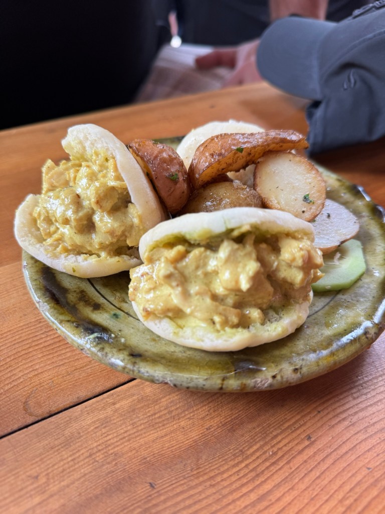 Plate with chicken burgers and roasted potatoes
