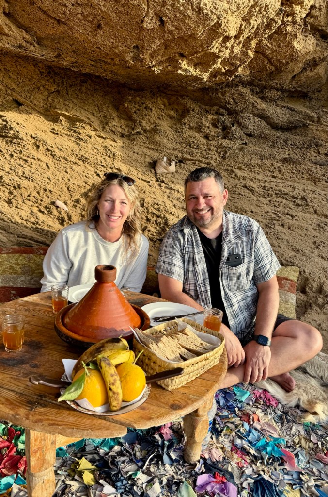 Man and woman having dinner in a cave